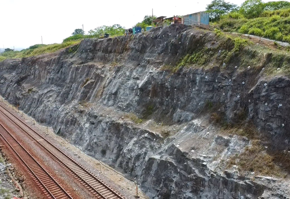 a train tracks on a hill